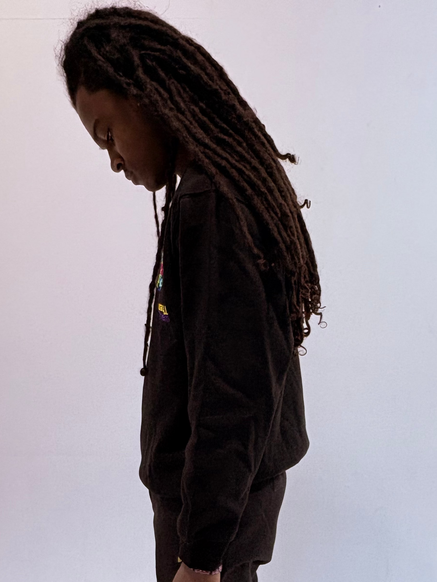 BLACK USNEVERTHEM SWEATER